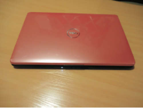 TWO YEAR OLD DELL INSPIRON LAPTOP WITH BLACK LAPTOP BAG