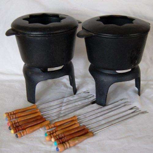 Pair of Cast Iron Fondue Pots on Stands with forks (No Burners). Each set weighs 2.85 Kg's