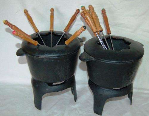 Pair of Cast Iron Fondue Pots on Stands with forks (No Burners). Each set weighs 2.85 Kg's