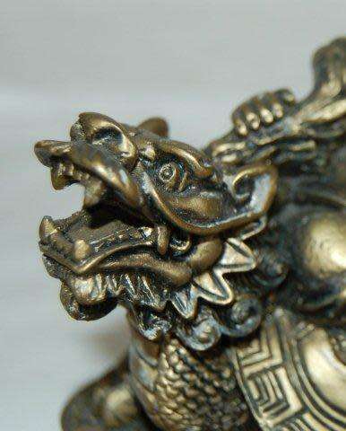 Laughing Composite Buddha on Dragon Turtle Holding Pearl of Wisdom - Height 110mm Width 110mm