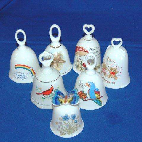 Collection of 7 Ceramic Bells - As per pictures - Sold as one lot - Tallest 110mm