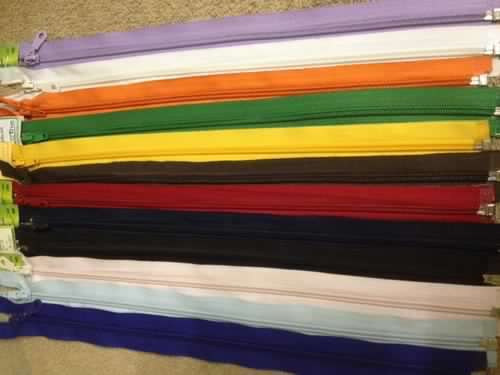 12 Assorted colours open end zips 40cm long