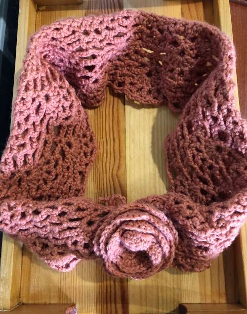 Unique handmade snood in light Brick colour with removable crochet flower