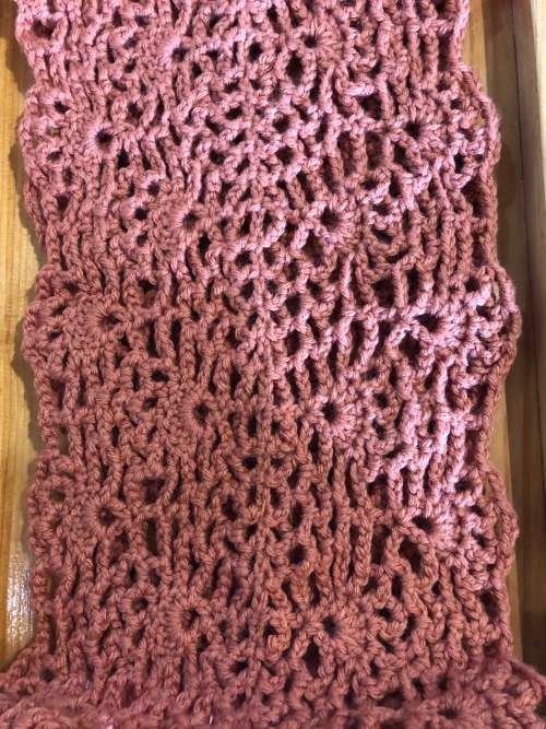 Unique handmade snood in light Brick colour with removable crochet flower