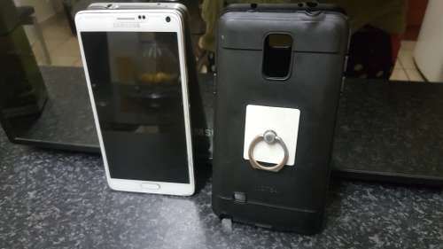 Samsung Note 4 white in colour. 5.7 inch