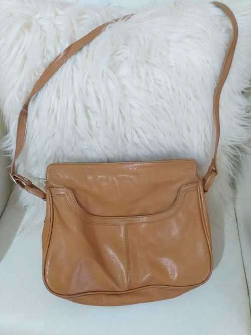 Genuine Leather  Designer Label Sling Bag( Excellent Condition) Good as new.