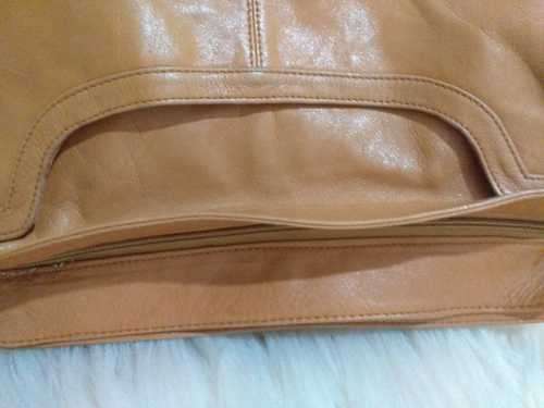 Genuine Leather  Designer Label Sling Bag( Excellent Condition) Good as new.