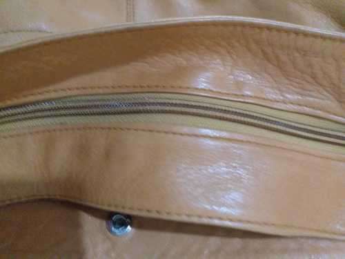 Genuine Leather  Designer Label Sling Bag( Excellent Condition) Good as new.
