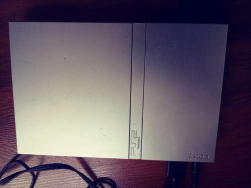 Playstation 2 console with box in fair condition ( please see pics) works 100%