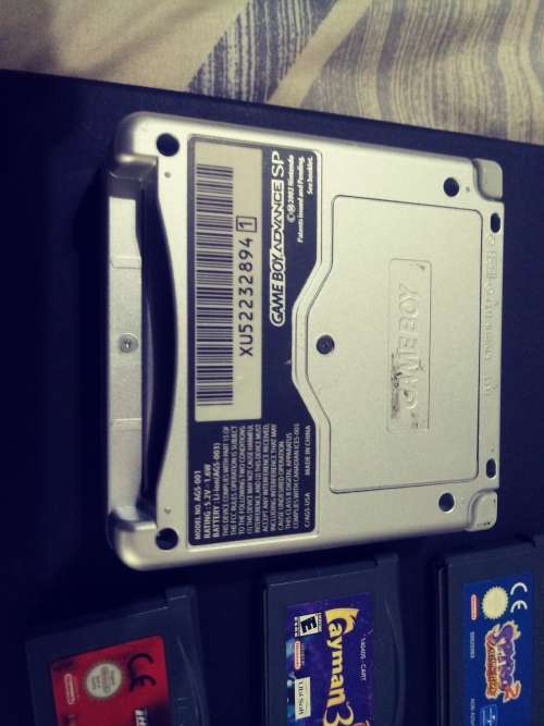 Game Boy Advance SP with 6 Games and Charger ( Good Condition)