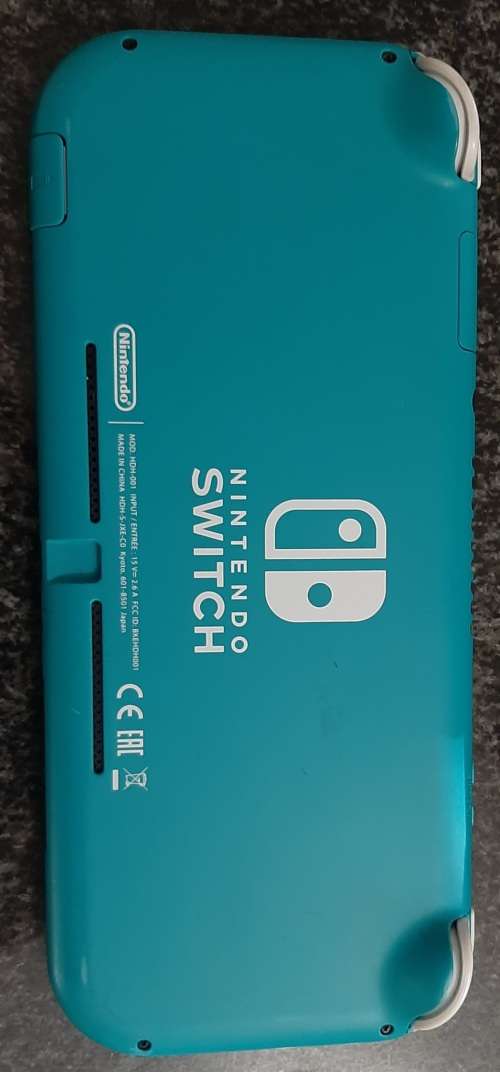 Nintendo Switch Lite( Has a crack in the body near the charging port no charger)