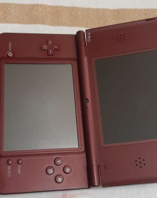 Nintendo DSi XL  with box( Good condition + 6 games)