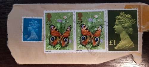 Misc UK STamps on part of envelope