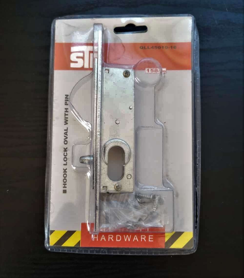 Sliding door cylinder lock with locating pin