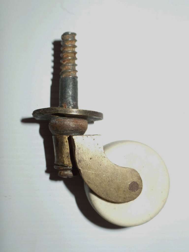 ANTIQUE LARGE VICTORIAN BRASS AND CERAMIC CASTORS X 4 - FOR DINING TABLE