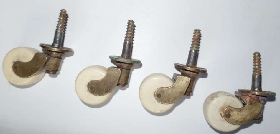 ANTIQUE LARGE VICTORIAN BRASS AND CERAMIC CASTORS X 4 - FOR DINING TABLE