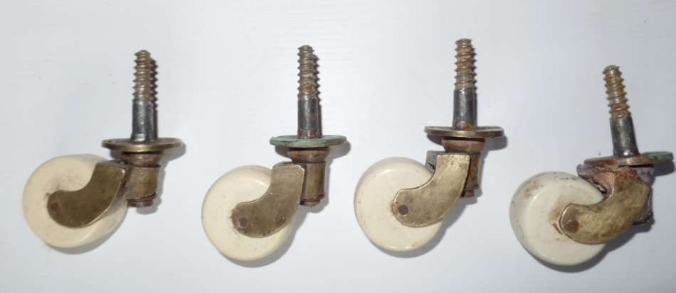 ANTIQUE LARGE VICTORIAN BRASS AND CERAMIC CASTORS X 4 - FOR DINING TABLE