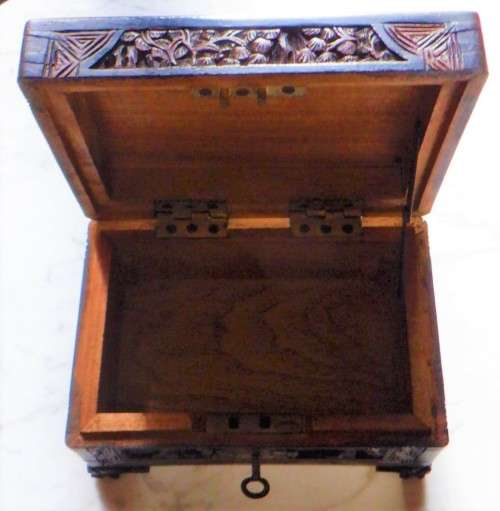 Vintage carved camphorwood jewellery box with key