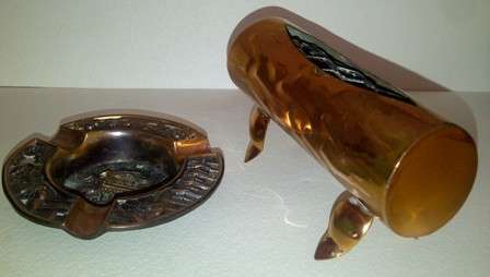 Two Small Metal Items (Postage R38)