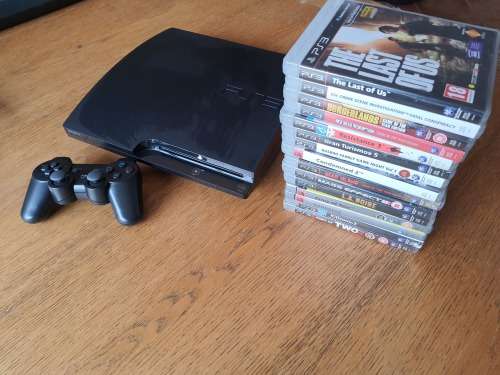 PS3 WITH 15 GAMES!