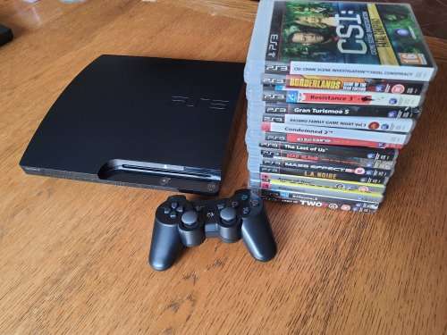 PS3 WITH 15 GAMES!