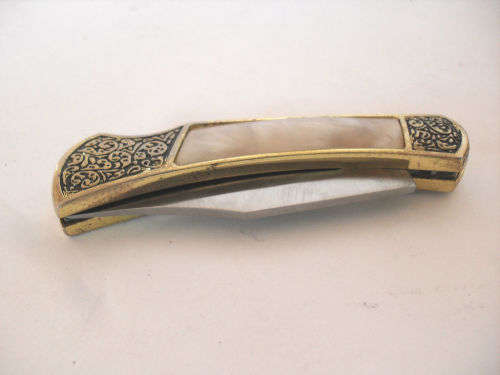 Vintage folding pocket knife, ornate handle, mother of pearl