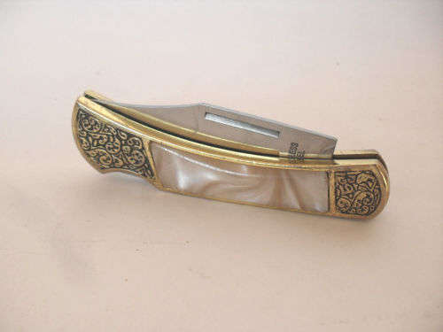 Vintage folding pocket knife, ornate handle, mother of pearl