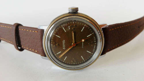 Vintage Soviet Men's wrist watch Wostok, round brown