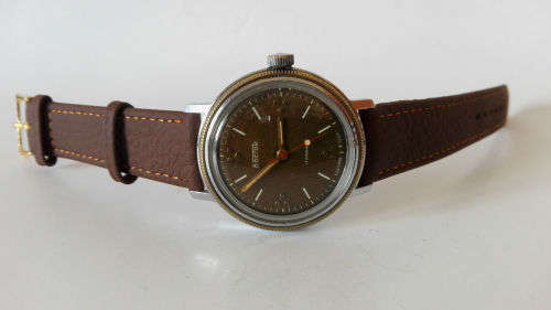 Vintage Soviet Men's wrist watch Wostok, round brown