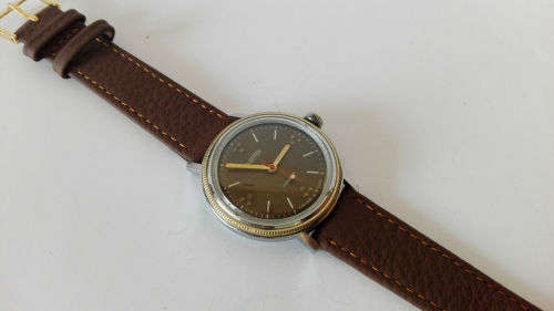 Vintage Soviet Men's wrist watch Wostok, round brown