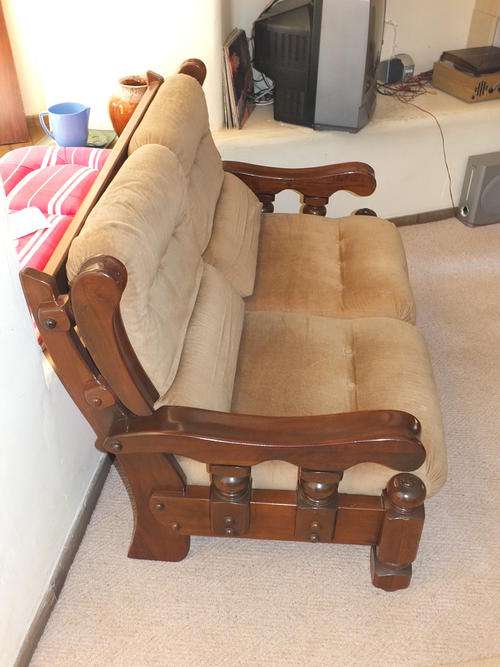 A solid old Imbuia lounge suit.