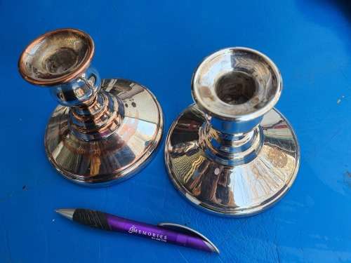 A PAIR OF VINTAGE CANDLESTICKS