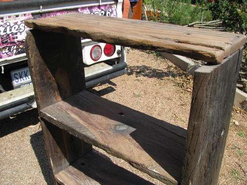 A VERY UNUSUAL ROUGHLY HEWN BOOKSHELF... FOUND AT A BUSH LODGE !! IN ITS SIMPLICITY IT IS BEAUTIFUL