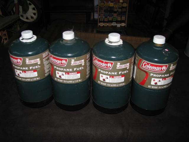 4 CANS OF PROPANE FUEL............. ALL FULL...... BID PER EACH