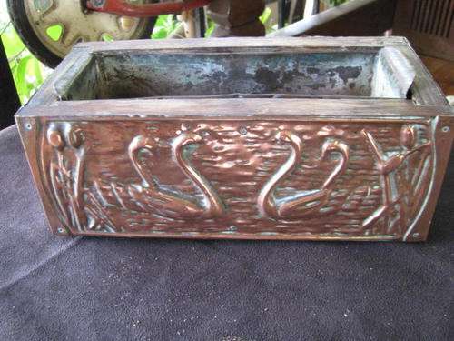 A REALLY LOVELY COPPER HOLDER FOR PLANTS OR FLOWERS....THIS STILL HAS ITS REMOVABLE LINER