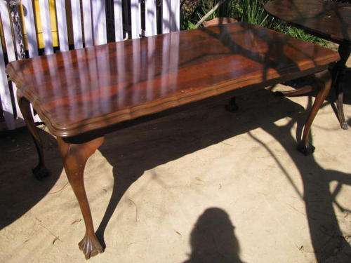 A VINTAGE 1940'S INMBUIA BALL AND CLAW LINEN FOLD TABLE.....8 SEATER
