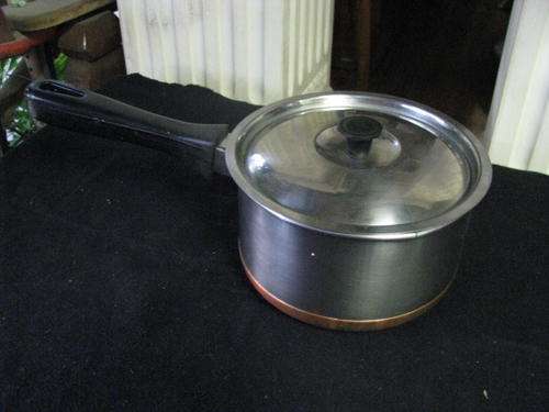 A STAINLESS STEEL COOKING POT WITH COPPER ON BASE..LID & HANDLE@CRAZY R1 START