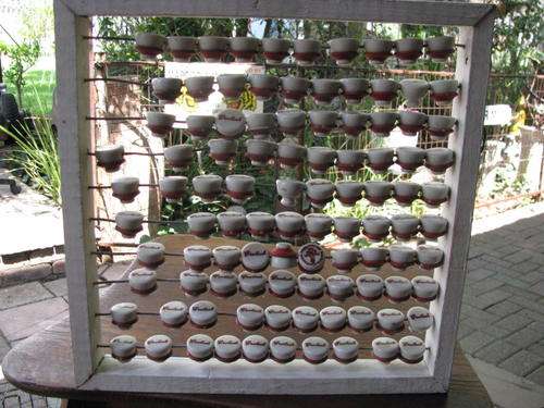 A HIGHLY COLLECTABLE ABACUS (COUNTING FRAME) MADE FROM OLD GROLSCH TOPS  @CRRAAAZY R1 START