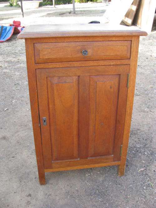 ANTIQUE TEAK PEDESTAL TYPE CUPBOARD CIRCA 1915-1920.... ONE DOOR , ONE DRAWER
