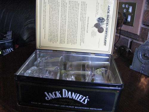 (NUMBER 3)A JACK DANIELS LARGE SQUARE TIN WITH HINGED LID...CONTAINS 6 GLASSES