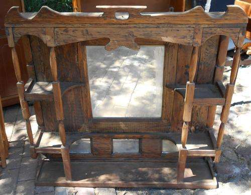 a beautiful and ornate Africana overmantle with Original Mirrors