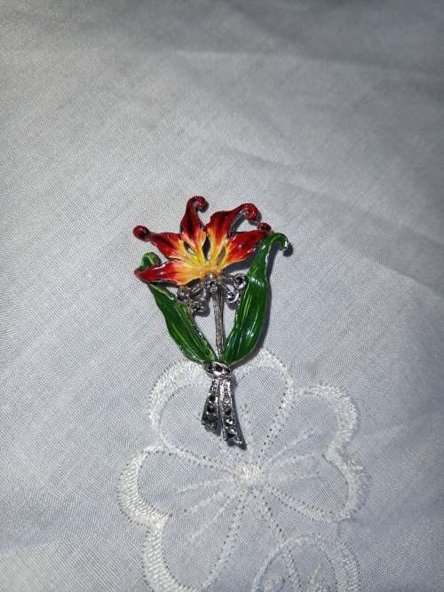 Stunning flame lilly enamel brooch