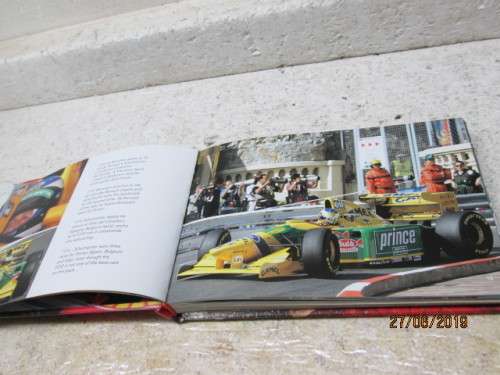HARD COVER BOOK : MICHAEL SCHUMACHER 7 WORLD CHAMPIONSHIPS - LOT 590W