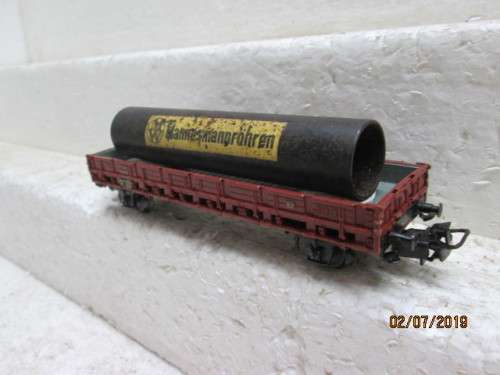HO SCALE MARKLIN OPEN GOODS WAGON WITH PIPE LOAD - LOT 659W