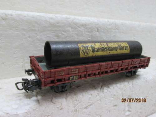 HO SCALE MARKLIN OPEN GOODS WAGON WITH PIPE LOAD - LOT 659W