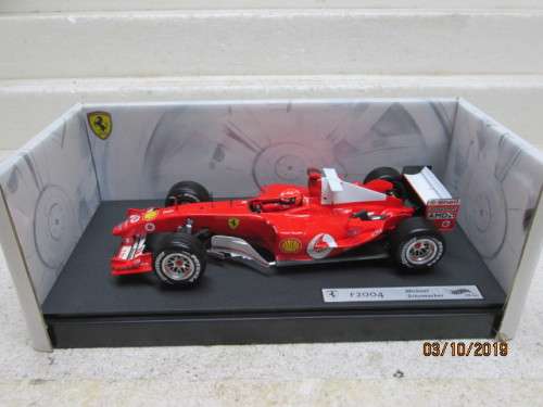 1:18 SCALE HOTWHEELS : F2004 F1 MICHAEL SCHUMACHER (BOXED) - LOT 857X