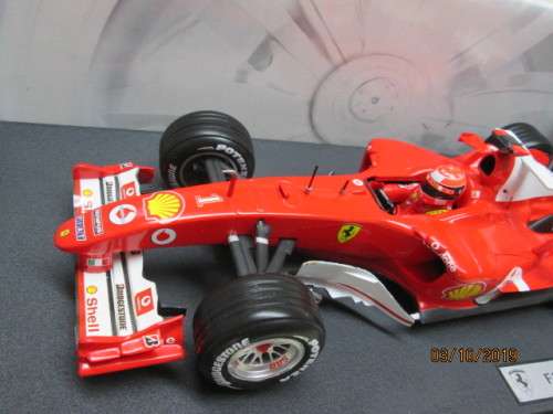 1:18 SCALE HOTWHEELS : F2004 F1 MICHAEL SCHUMACHER (BOXED) - LOT 857X