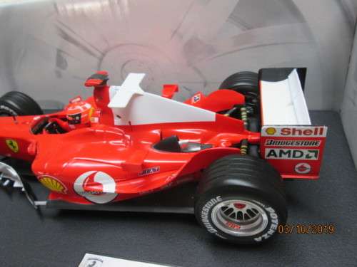 1:18 SCALE HOTWHEELS : F2004 F1 MICHAEL SCHUMACHER (BOXED) - LOT 857X