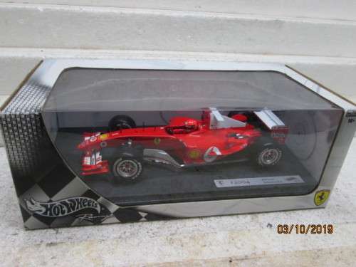 1:18 SCALE HOTWHEELS : F2004 F1 MICHAEL SCHUMACHER (BOXED) - LOT 857X