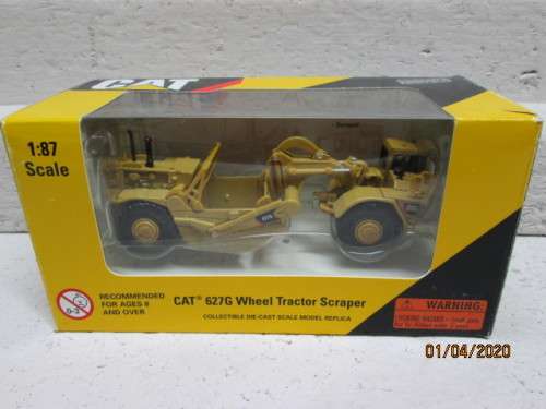 HO SCALE : NORSCOT CAT 627G WHEEL TRACTOR SCRAPER (BOXED) - LOT 991z